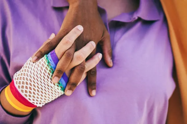 gay-women-couple-holding-their-hands-at-pride-para-2026-01-11-08-12-06-utc-697b6d4d90e0c