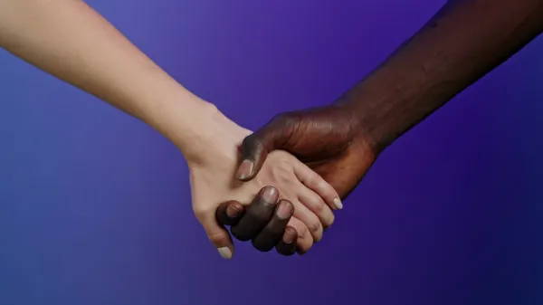 hands-of-african-man-and-white-woman-holding-toget-2026-01-07-06-33-24-utc-697b75de504bf