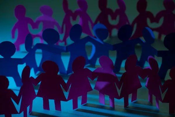 paper-dolls-holding-hands-symbolizing-union-and-te-2026-01-11-10-28-39-utc-697b75f854646